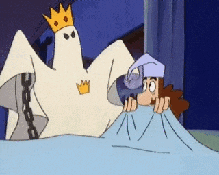 a cartoon of a ghost with a crown on his head standing next to a person in bed .