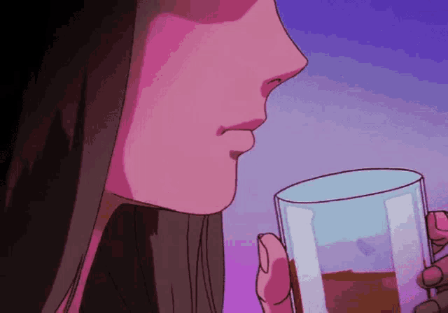 a woman is drinking from a glass with a pink background