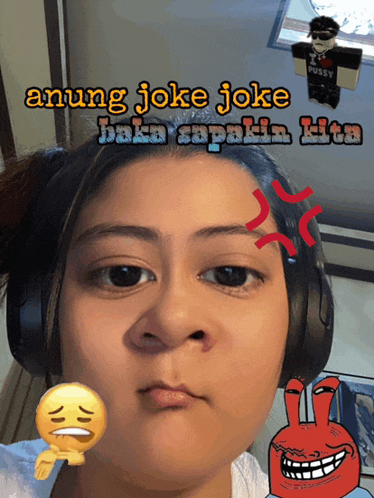 a woman wearing headphones has a sticker on her face that says ' anung joke joke baka sapakin kita '