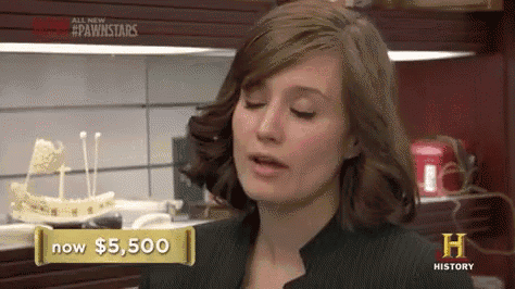 a woman is talking in front of a sign that says $ 5,500