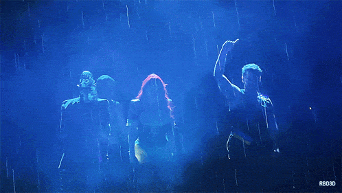 a man and a woman are dancing in the rain with rb30d written on the bottom right