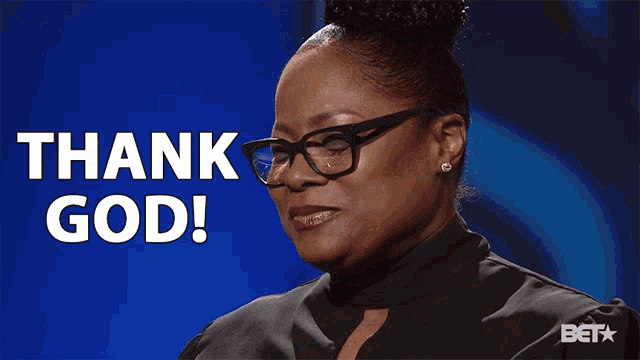 a woman wearing glasses says " thank god " on a blue background