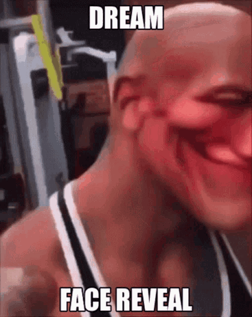 a bald man is making a funny face with the words dream face reveal below him