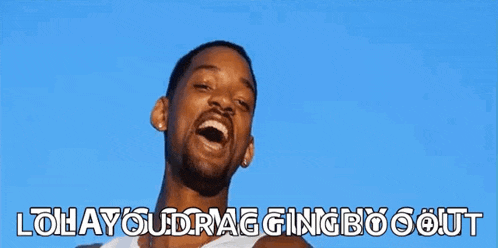 a man with a beard is pointing at the camera with the words " lolay your drag ging boo out " written below him