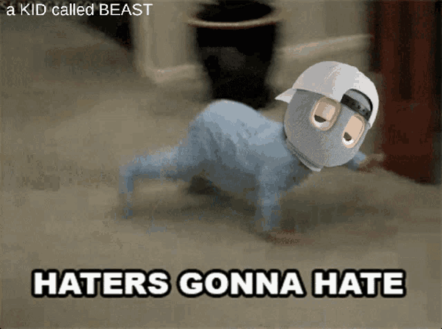a baby wearing a mask is crawling with the words haters gonna hate underneath