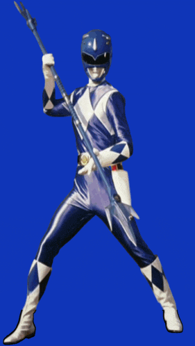 a white power ranger is holding a sword in his right hand