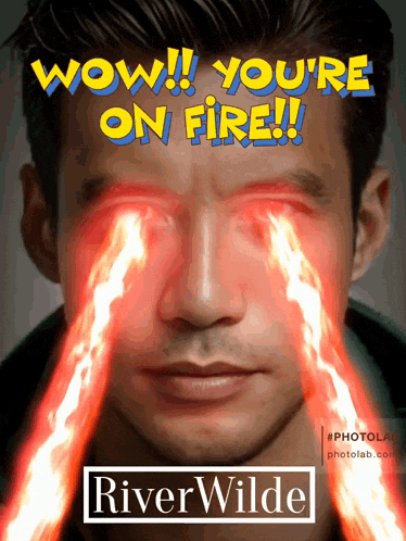 a poster of a man with fire coming out of his eyes