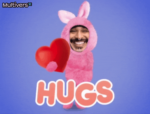 a man in a pink bunny costume is holding a red heart with the words hugs below him