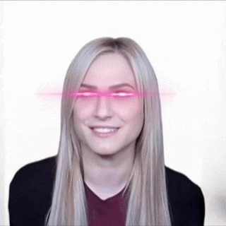 a woman with long blonde hair and pink eyes is smiling and looking at the camera .