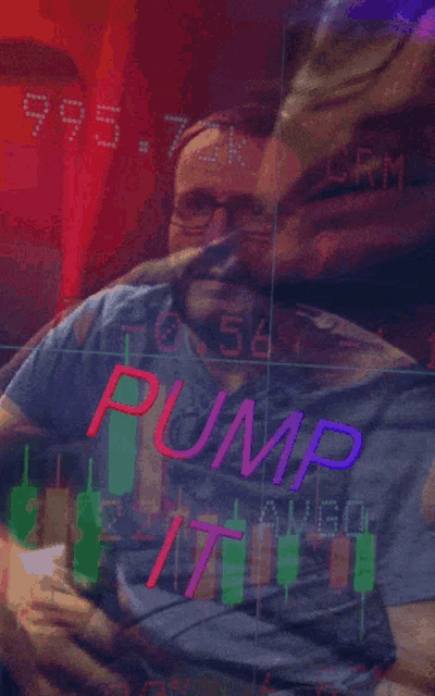 a man sitting in front of a screen that says pump it on it