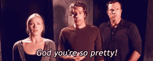 a group of people standing next to each other with the words god you 're so pretty