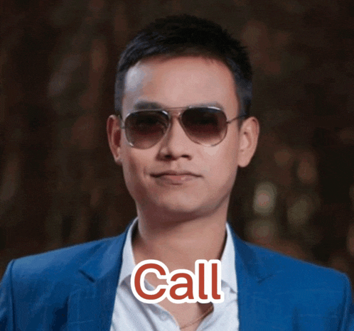 a man wearing sunglasses and a blue suit has the word call above his face
