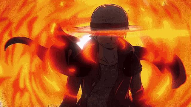 a man in a hat is surrounded by fire