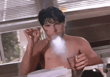 Corey Feldman Smoking Cigarettes GIF - Corey Feldman Smoking Cigarettes Evil Obsession GIFs