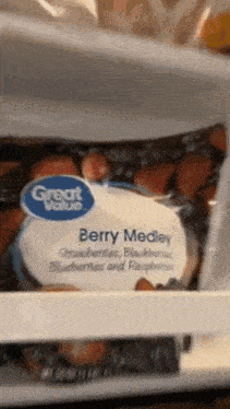 a bag of berry medley from great value is in a refrigerator
