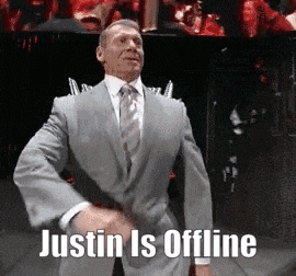 a man in a suit and tie is dancing with the caption justin is offline .