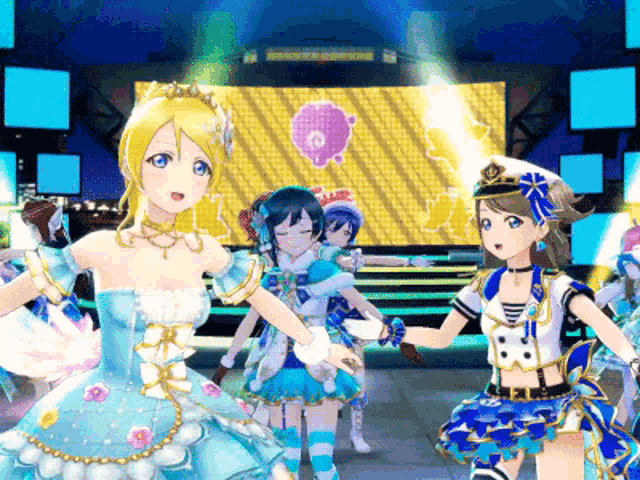 a group of anime girls are dancing in front of a stage