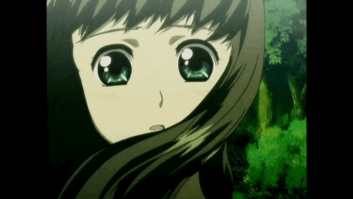 a close up of a anime girl 's face with green eyes