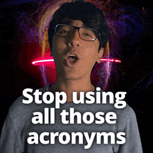 a man wearing glasses stands in front of a neon sign that says stop using all those acronyms