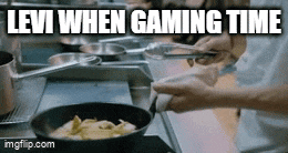 a person is cooking food on a stove with the words levi when gaming time written above them