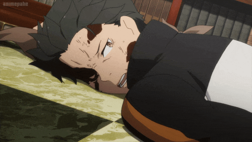 a man laying on the floor with animepahe written on the bottom left