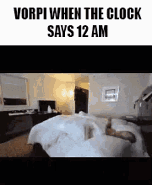 a person is laying on a bed in a hotel room .