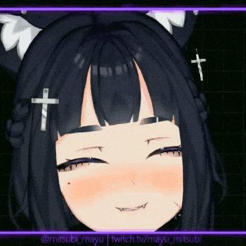 a girl with black hair and cat ears is making a funny face .