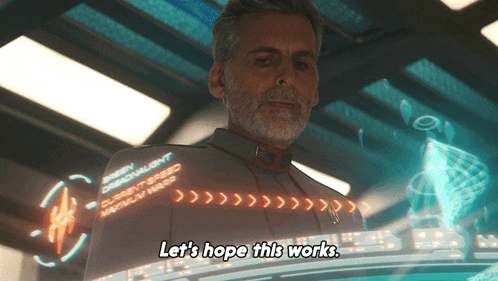 a man says let 's hope this works in front of a computer screen
