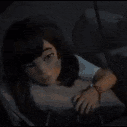 a close up of a cartoon girl wearing a watch and a bracelet .