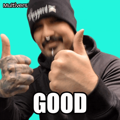 a man giving a thumbs up with the word good in the corner