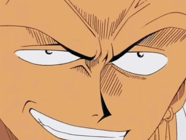 a close up of a woman 's face with orange hair
