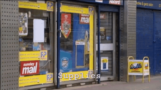 a storefront with a sign that says supplies on it