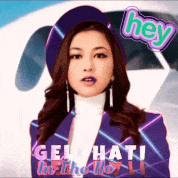 a woman wearing a purple beret and a white turtleneck says " hey "