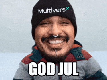 a man with a beard wearing a beanie that says multivers
