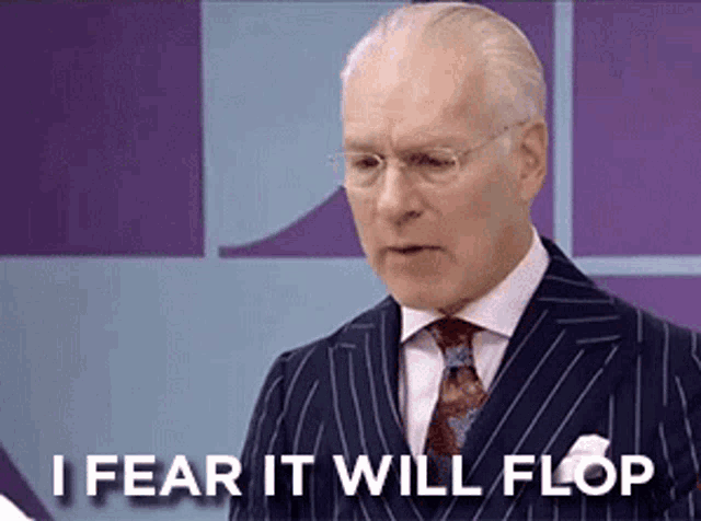 a man in a suit and tie is saying " i fear it will flop "