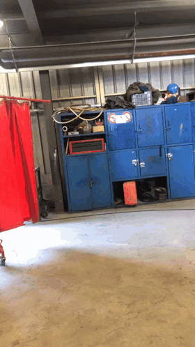 a blue locker with a sticker on it that says no welding