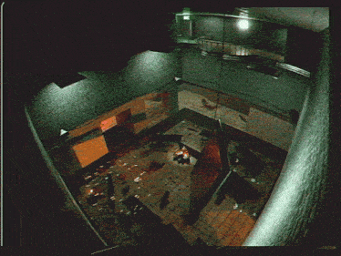 an aerial view of a dark room with a few lights on the walls