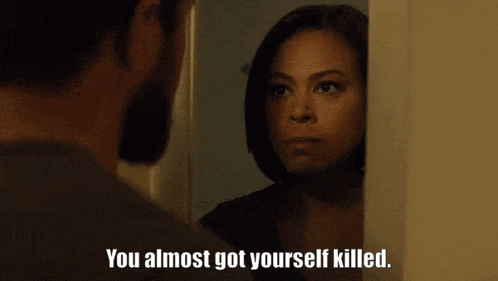 a man and a woman are looking at each other and the woman is saying " you almost got yourself killed "