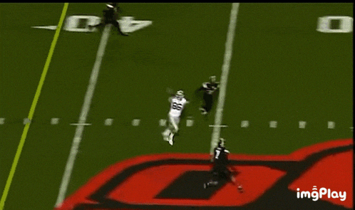 a football game is being played on a field that has the letter d on it