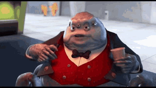 a cartoon character in a suit and bow tie is sitting in a chair holding a cup .