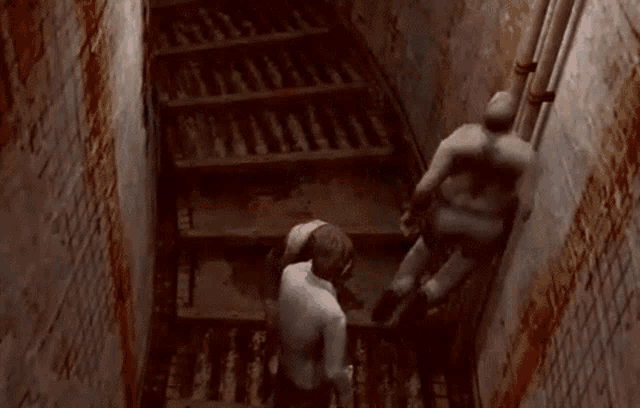 a man is walking down a set of stairs next to a monster .
