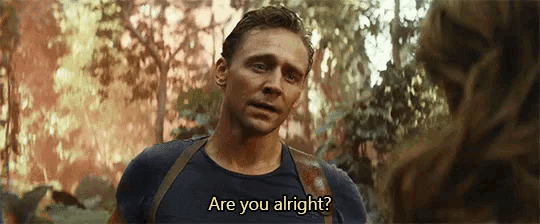 a man is talking to a woman in a forest and says `` are you alright ? ''