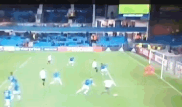 a blurry picture of a soccer game being played