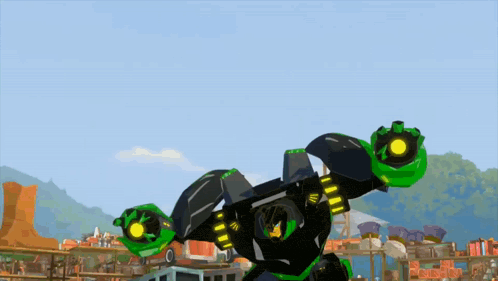 a black and green robot is standing in front of a building with a truck in the background