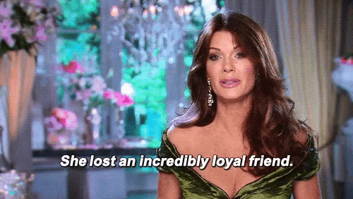 a woman in a green dress is saying she lost an incredibly loyal friend