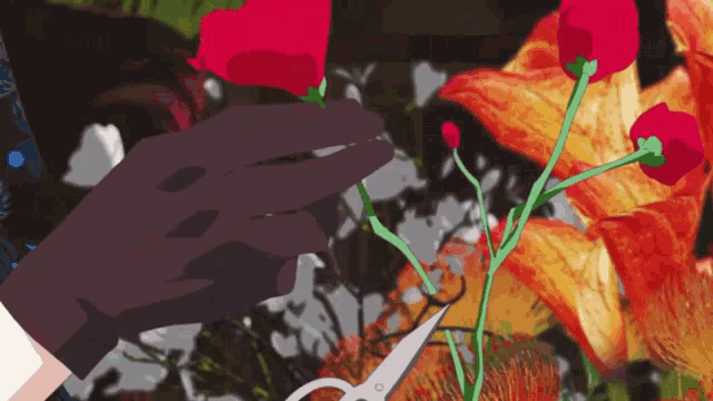 a person is cutting a flower with scissors