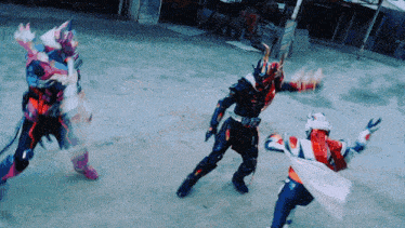 a group of anime characters are fighting each other on a dirt field