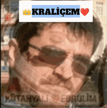 a picture of a man with sunglasses and the words kralicem