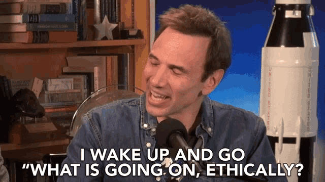 a man in a denim shirt says " i wake up and go what is going on ethically "