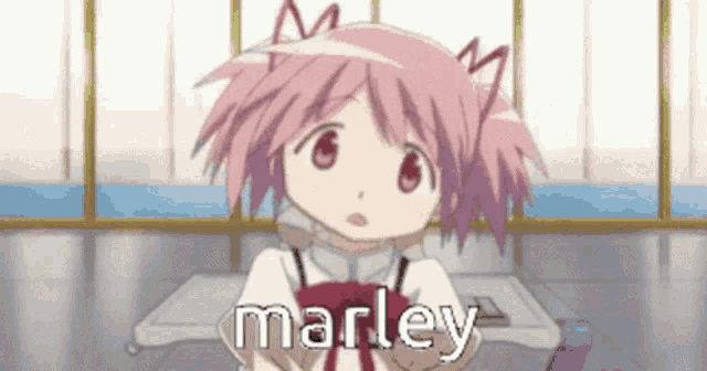a pink haired anime girl is sitting at a table with the name marley written on the bottom .